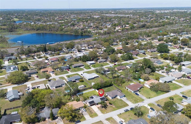 bird's eye view with a residential view and a water view