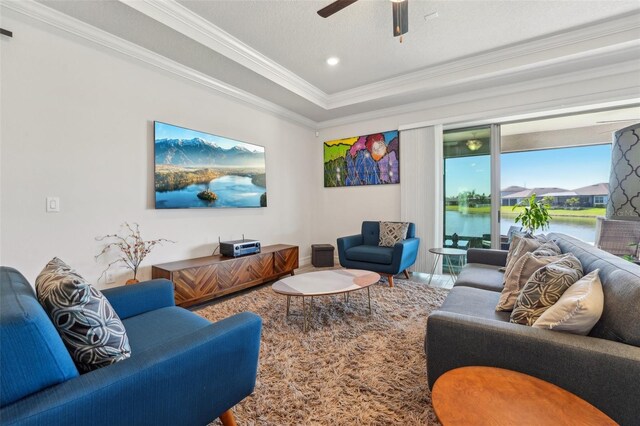 living room with ceiling fan, recessed lighting, and ornamental molding