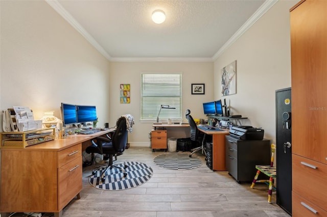 home office with baseboards, a textured ceiling, ornamental molding, and light wood finished floors