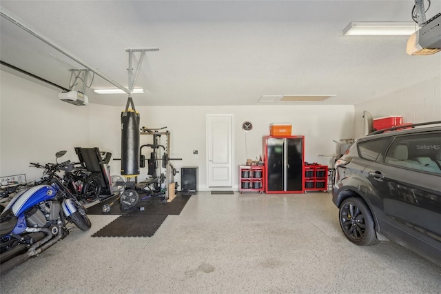 garage featuring a garage door opener