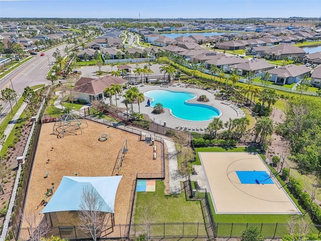 birds eye view of property with a residential view