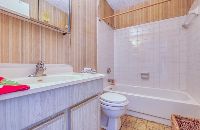 full bathroom with vanity, wallpapered walls, a textured ceiling, shower / bathing tub combination, and toilet