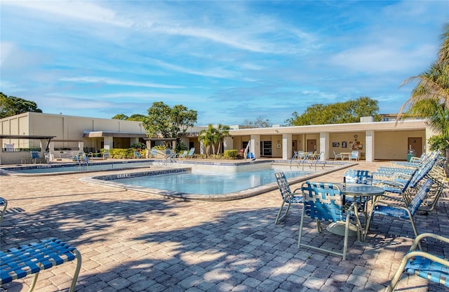 pool with a patio