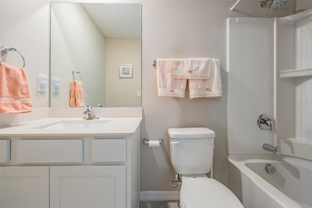 full bath featuring shower / bathing tub combination, toilet, and vanity