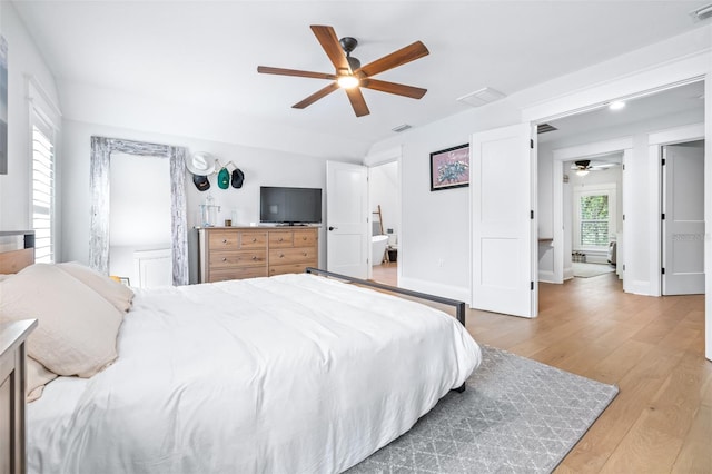 bedroom with visible vents, baseboards, and light wood-style floors