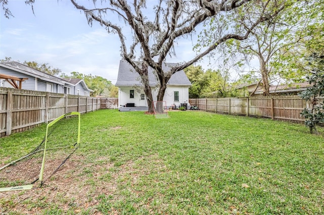 view of yard featuring a fenced backyard