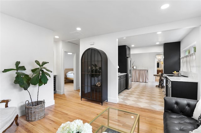 interior space featuring recessed lighting and light wood-style flooring