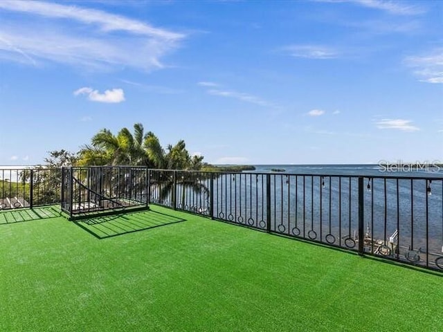 view of yard with a water view