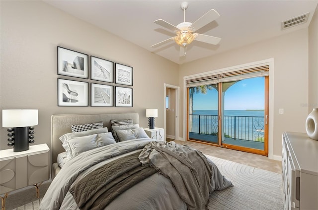 bedroom with access to exterior, visible vents, baseboards, and carpet floors