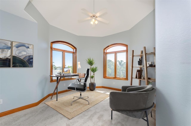 office featuring baseboards, carpet floors, and a healthy amount of sunlight