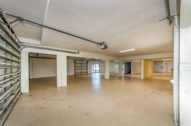 parking deck featuring a garage door opener