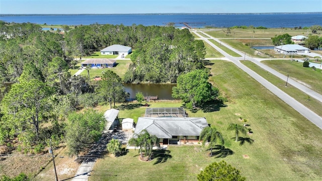 drone / aerial view with a water view