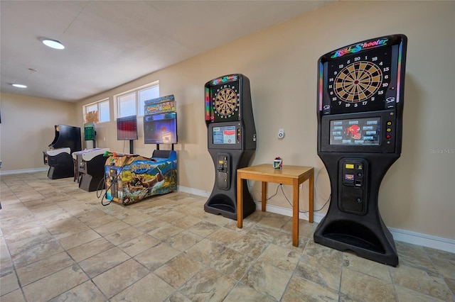 game room with baseboards