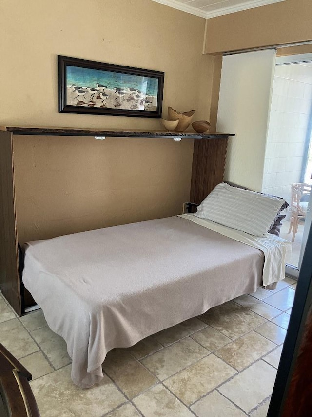 bedroom with ornamental molding