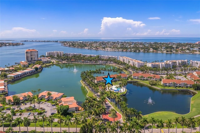 drone / aerial view with a water view and a view of city