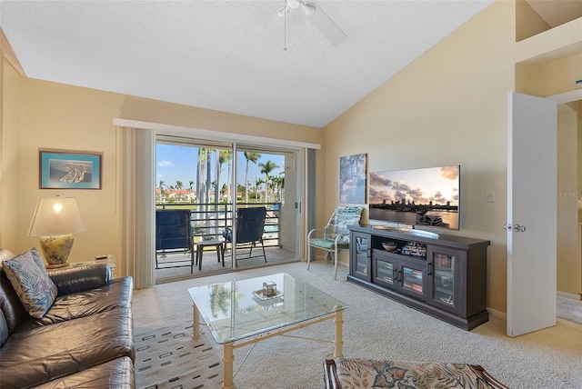 carpeted living area featuring vaulted ceiling, a ceiling fan, baseboards, and a textured ceiling