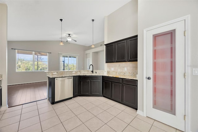 kitchen with light tile patterned floors, a ceiling fan, a peninsula, vaulted ceiling, and dishwasher