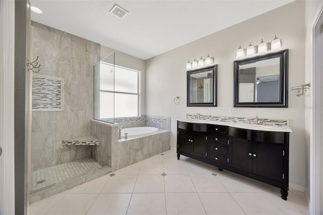 full bath featuring visible vents, double vanity, a walk in shower, tile patterned floors, and a bath