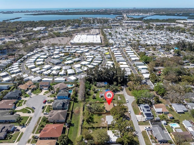 aerial view featuring a residential view and a water view