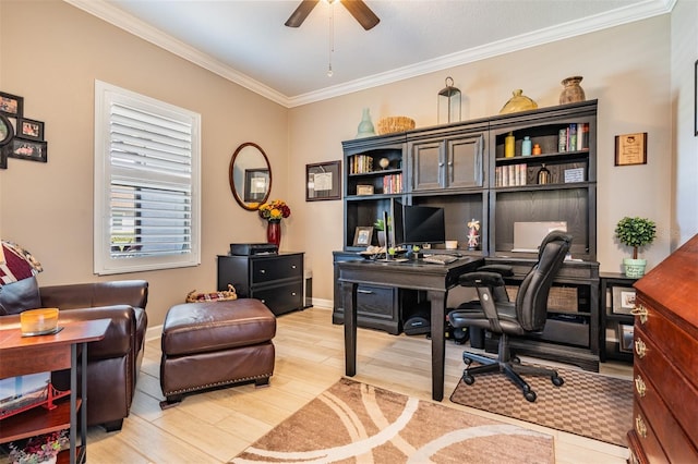 office featuring ceiling fan, light wood-style flooring, baseboards, and ornamental molding