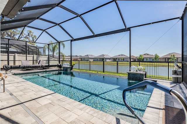 view of pool with a patio, a fenced backyard, a residential view, a fenced in pool, and a lanai