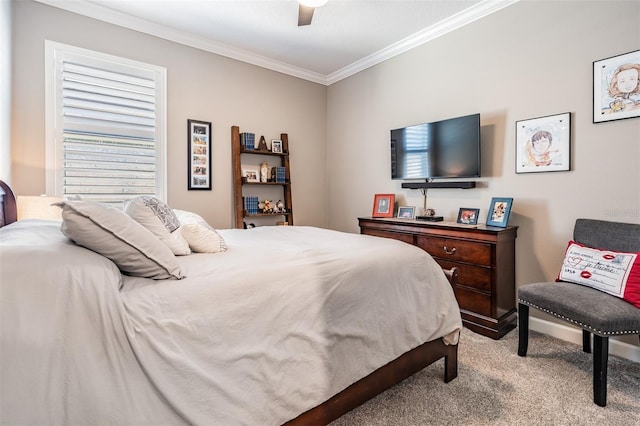 bedroom featuring a ceiling fan, carpet flooring, and crown molding