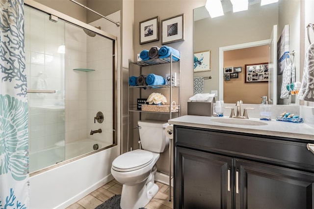 full bath featuring vanity, toilet, wood finished floors, and shower / tub combo with curtain