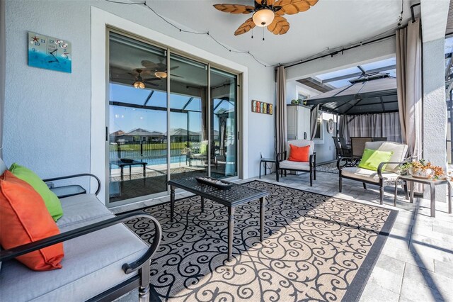 view of patio featuring a ceiling fan