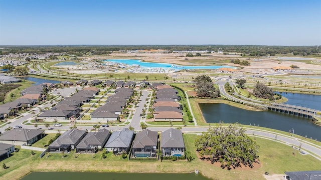 birds eye view of property featuring a residential view and a water view