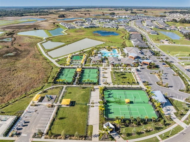 drone / aerial view with a water view