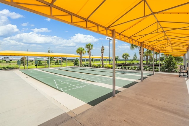 view of community with shuffleboard