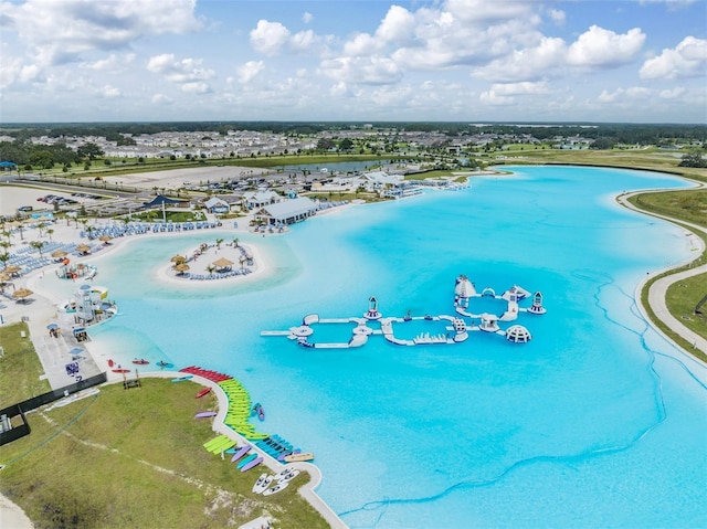 birds eye view of property featuring a water view