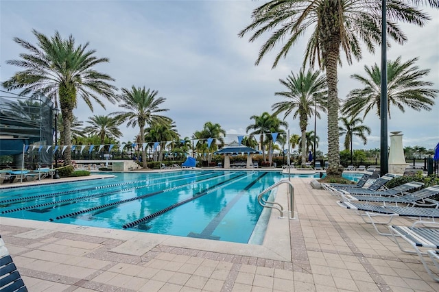 community pool featuring a patio area