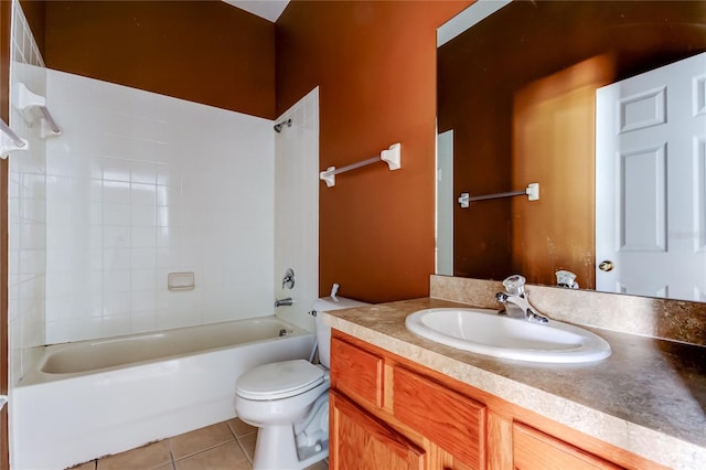 bathroom featuring tile patterned flooring, vanity, toilet, and tub / shower combination