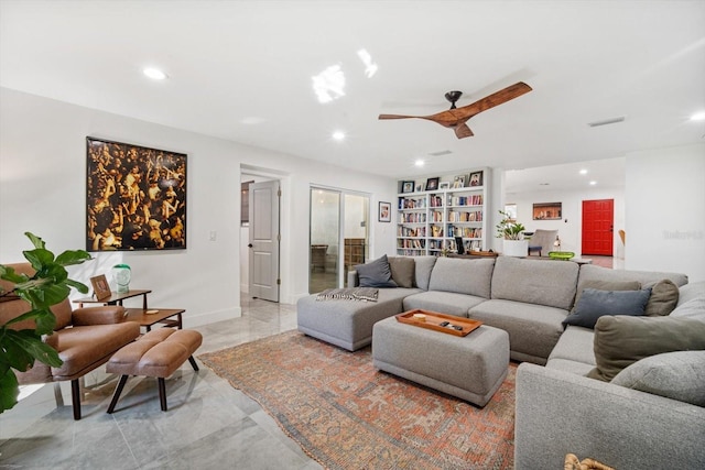 living area with recessed lighting, visible vents, baseboards, and a ceiling fan