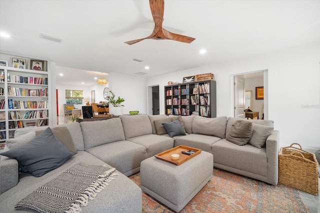 living room featuring recessed lighting, visible vents, and ceiling fan