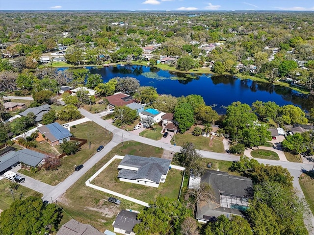 bird's eye view featuring a residential view and a water view