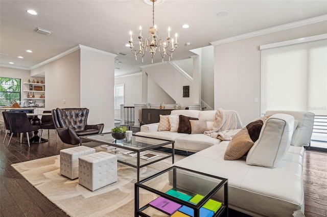 living area with visible vents, ornamental molding, wood finished floors, recessed lighting, and stairway