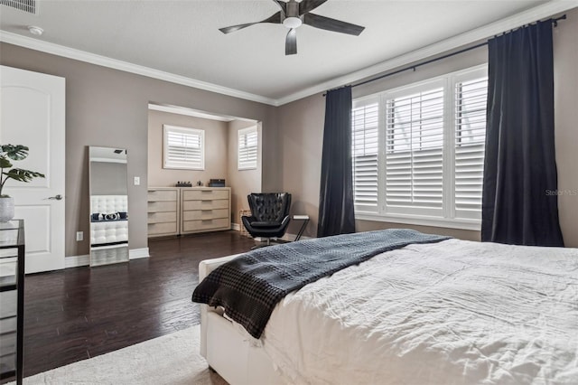 bedroom featuring multiple windows, wood finished floors, and ornamental molding