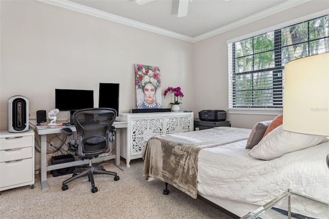 bedroom with ceiling fan, carpet, and ornamental molding