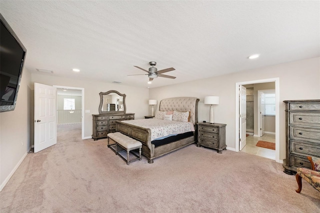 bedroom featuring visible vents, baseboards, recessed lighting, ceiling fan, and light carpet