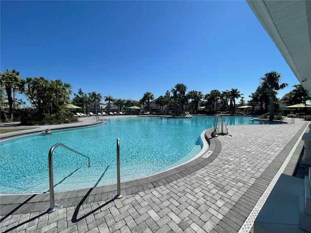 pool featuring a patio area