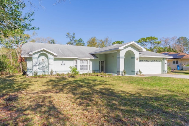 single story home with stucco siding, concrete driveway, a front lawn, and a garage