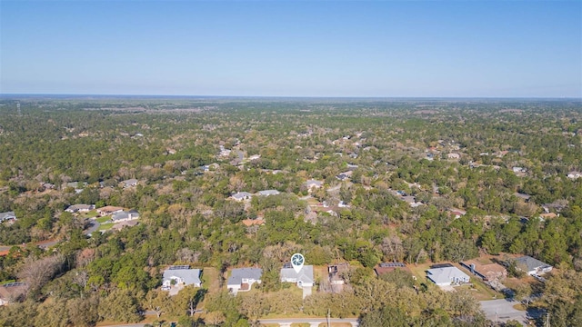 drone / aerial view with a forest view