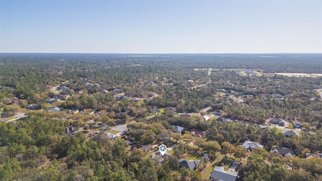 drone / aerial view with a view of trees