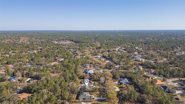 bird's eye view featuring a forest view