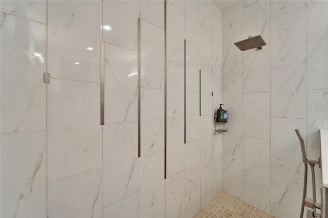 full bath featuring a shower stall