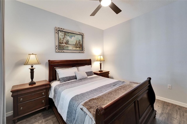 bedroom with dark wood finished floors, ceiling fan, and baseboards