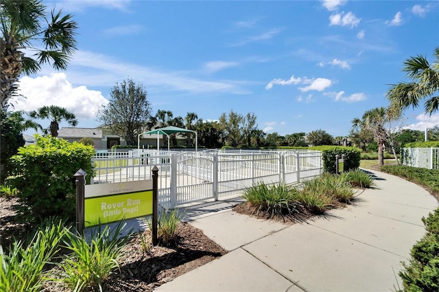 view of community featuring a gate and fence