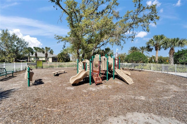 community jungle gym featuring fence